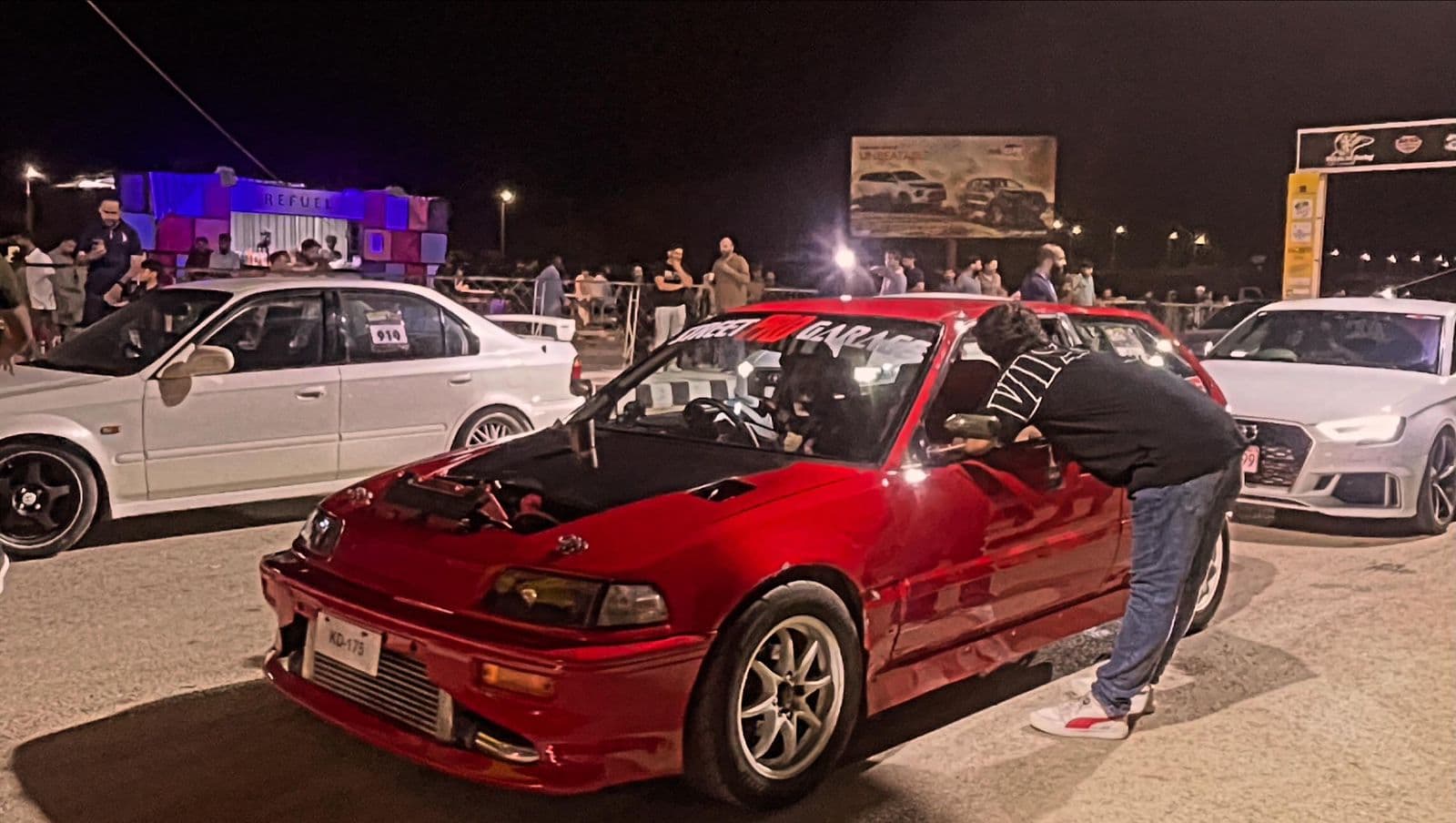 Street PRO Garage K24 turbo Honda at a night car meet