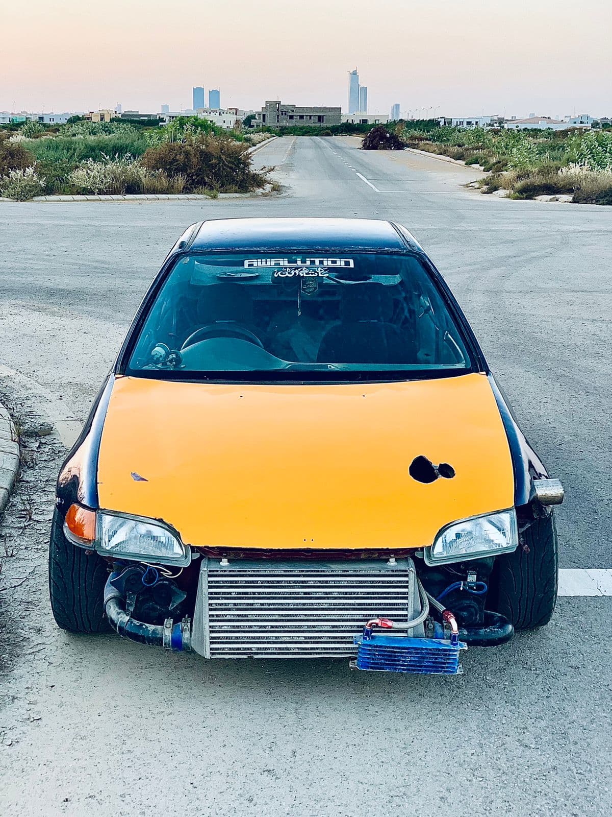 Honda D16 turbo build with front-mount intercooler and oil cooler
