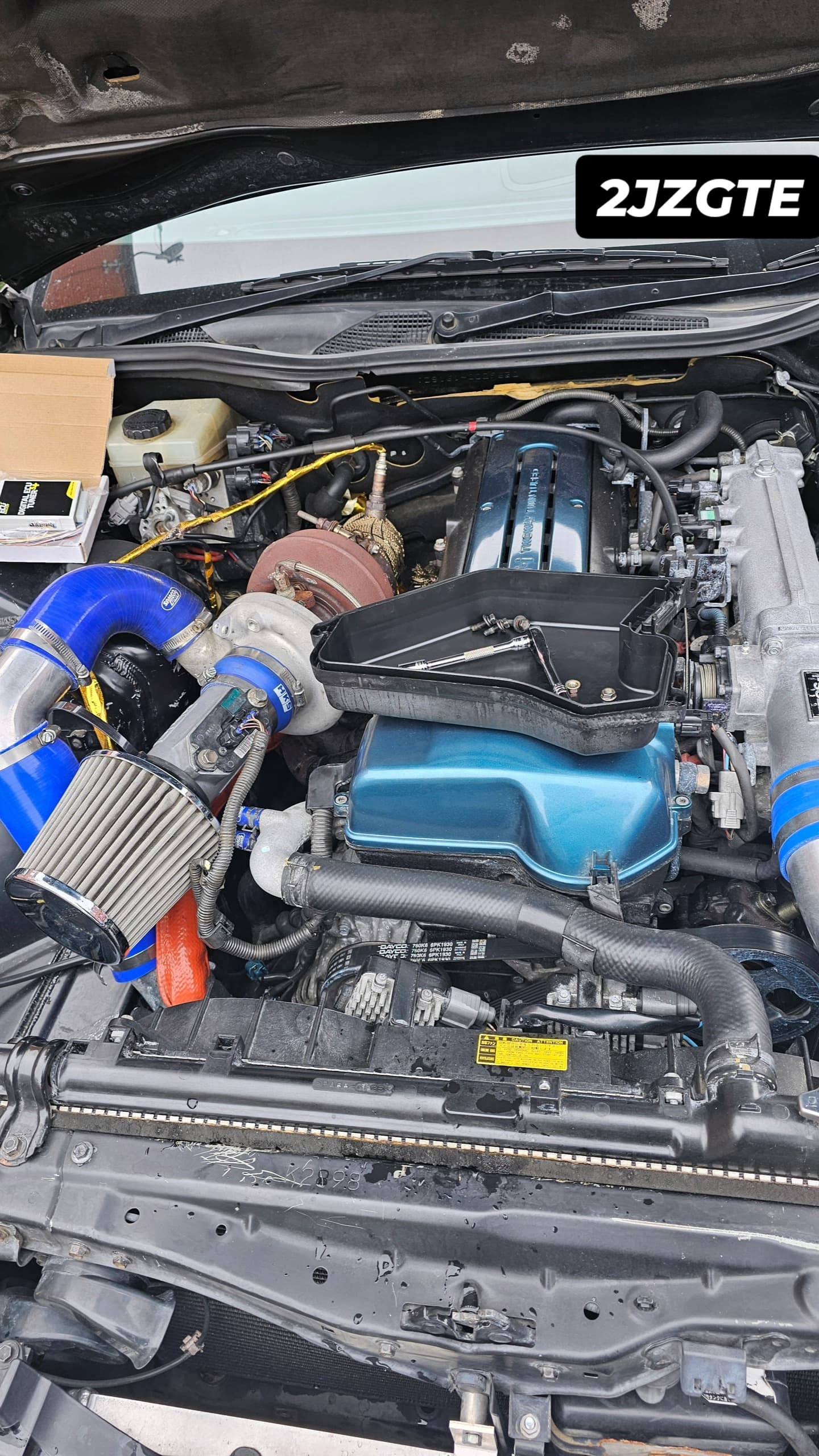 Toyota Aristo 2JZGTE engine bay with single big turbo and blue silicone piping
